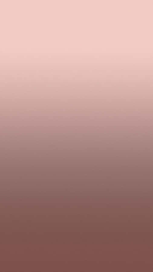 A Pink And Brown Gradient Wallpaper Wallpaper