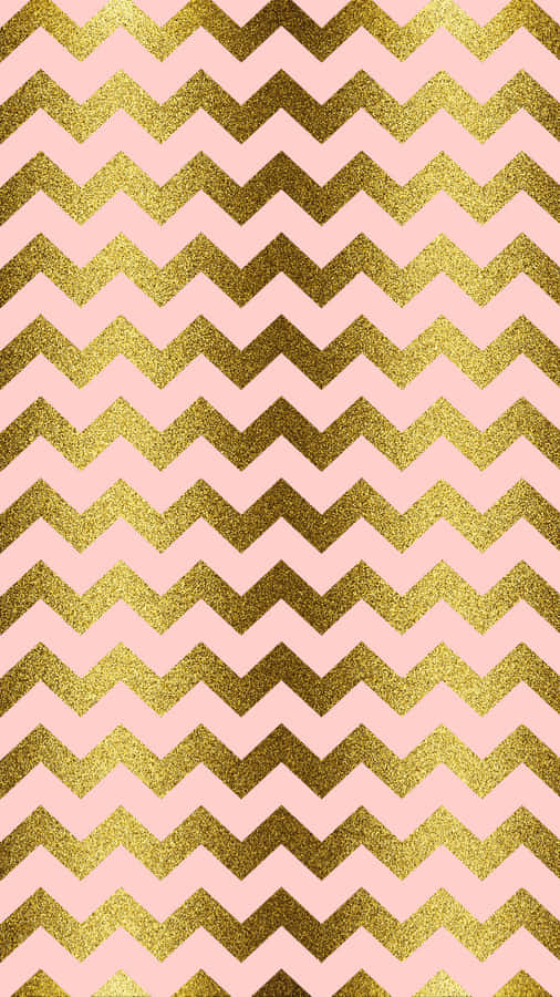 A Pink And Gold Chevron Pattern Wallpaper