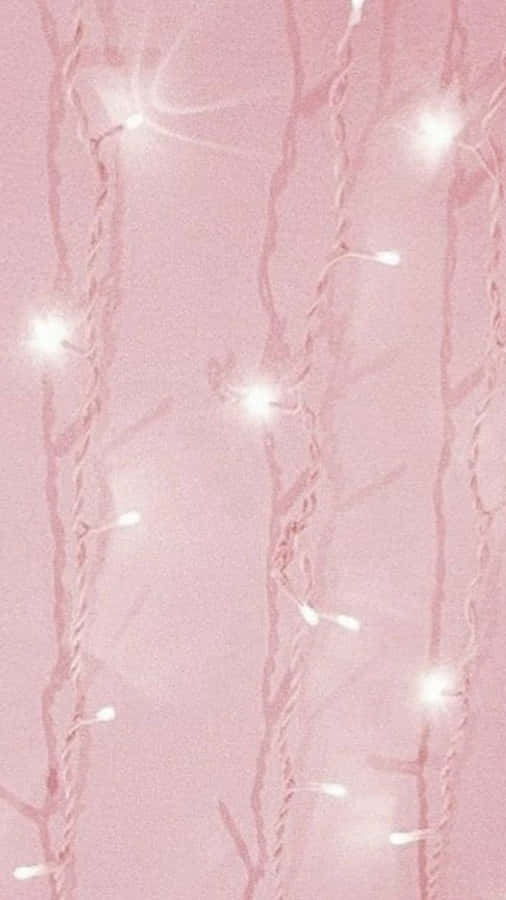 A Pink Background With White Lights On It Wallpaper