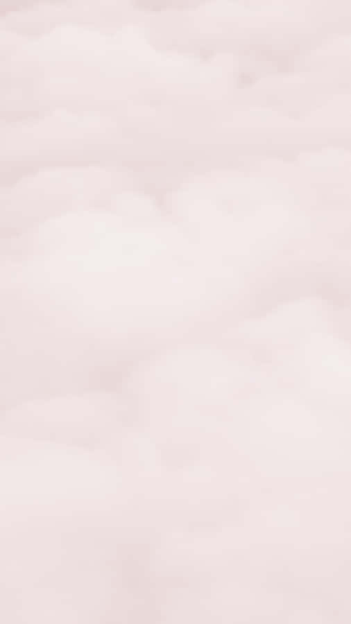A Pink Cloud With A Plane Flying Over It Wallpaper