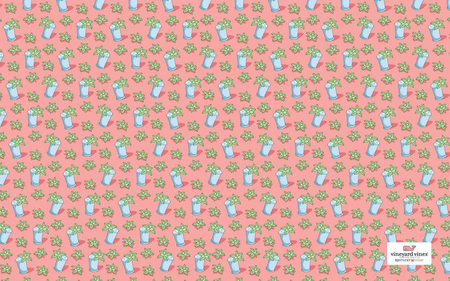 A Pink Fabric With Blue And Green Flowers Wallpaper