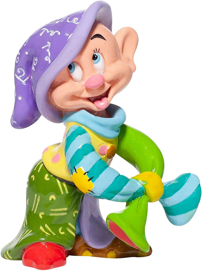 A Playful Statue Of Dopey Dwarf From Disney's Snow White Wallpaper