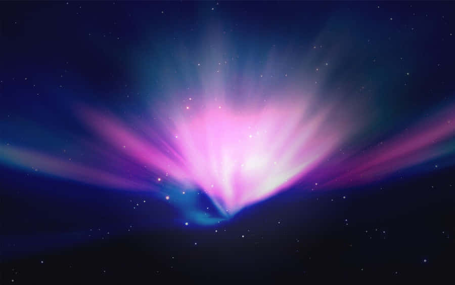 A Purple And Blue Starburst In The Sky Wallpaper