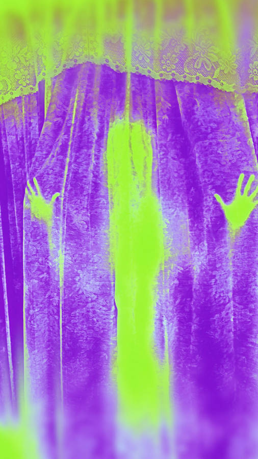 A Purple And Green Image Of A Ghost Wallpaper