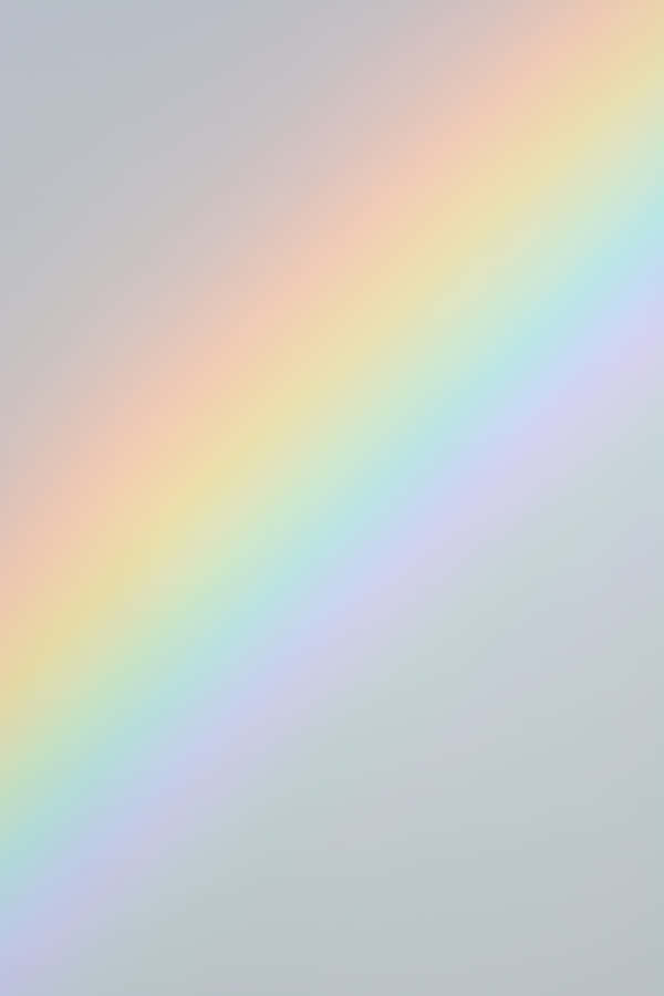 A Rainbow Is Shown On A Gray Background Wallpaper