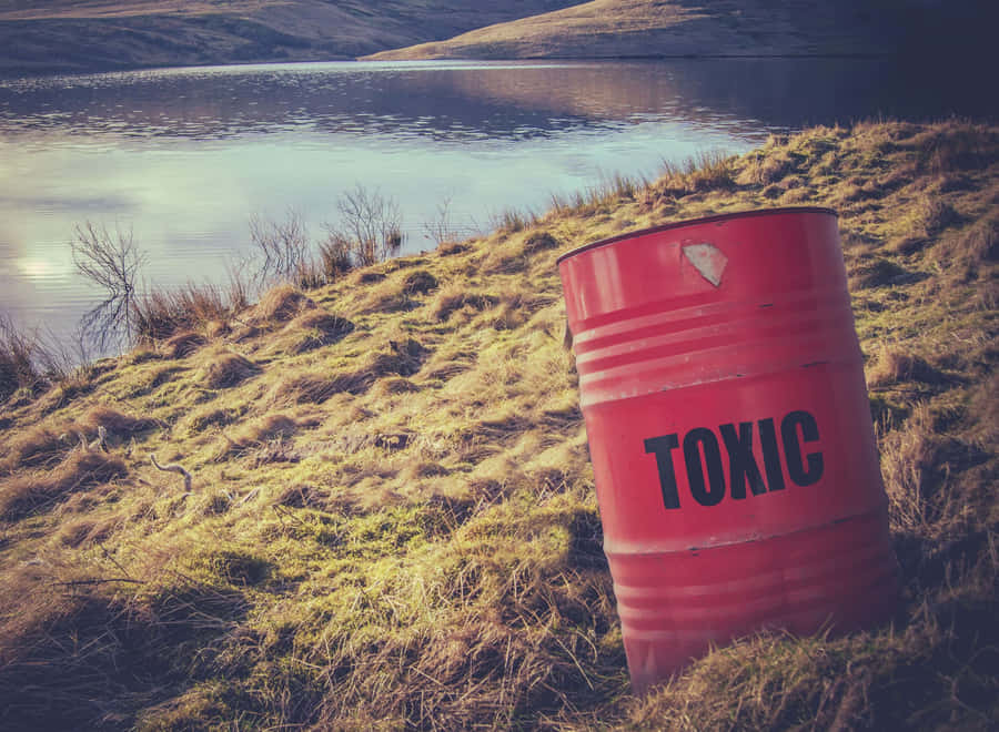 A Red Barrel With The Word Tonic On It Wallpaper