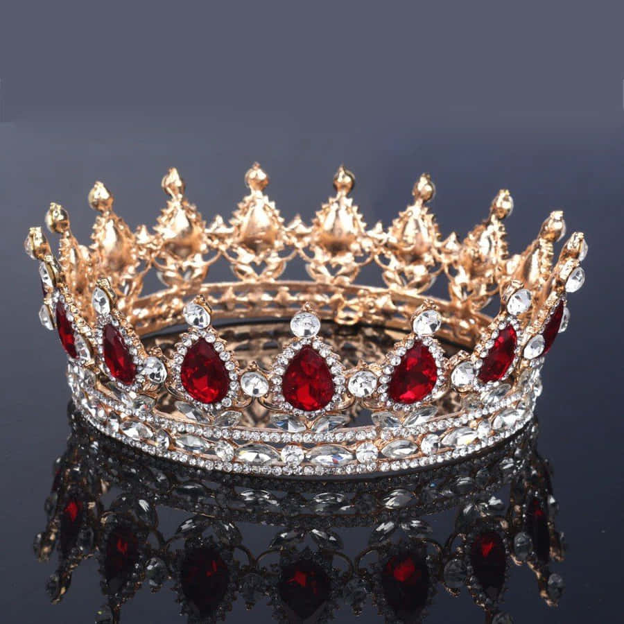 A Red Crown With Crystals On It Wallpaper