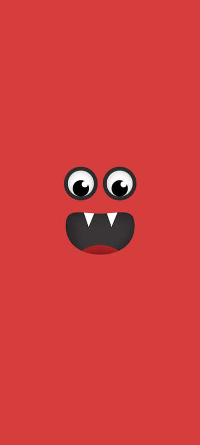 A Red Monster Face With Black Eyes Wallpaper