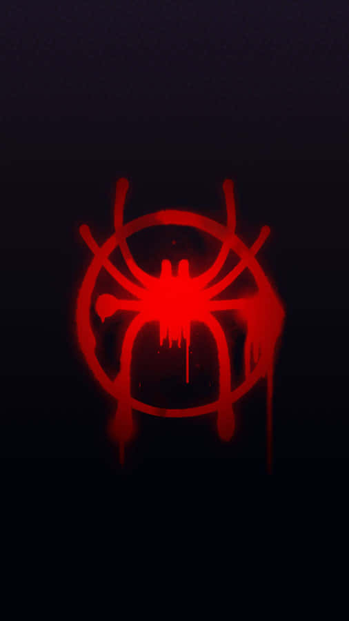 A Red Spider Logo On A Black Background Wallpaper