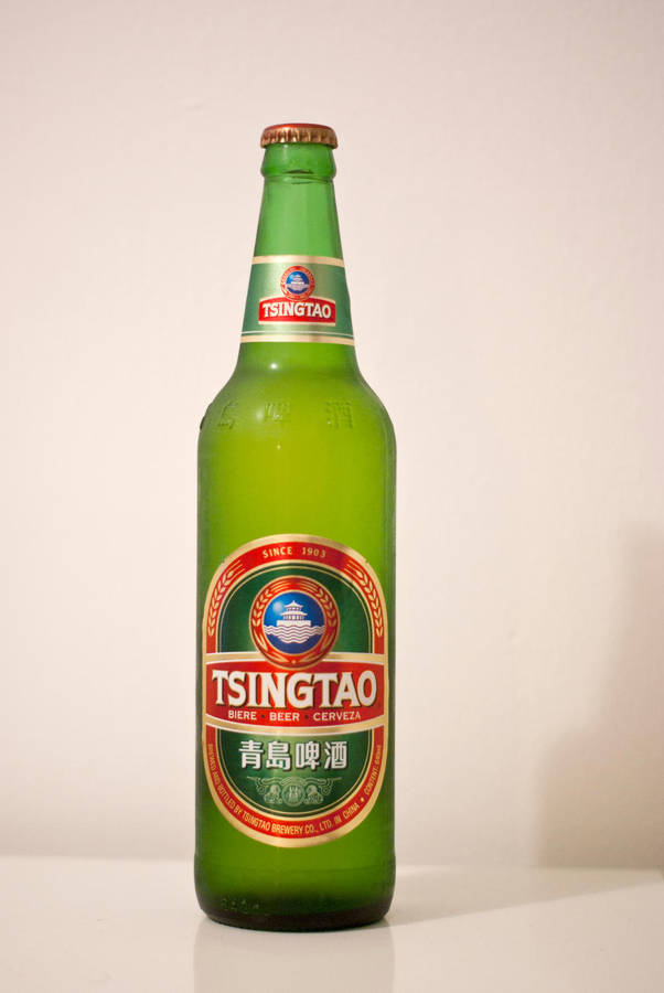 A Refreshing Taste Of Quality - Tsingtao Light Lager Beer Wallpaper