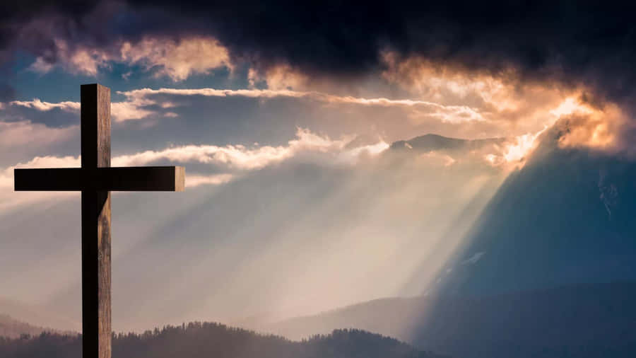 A Scene Of Faith, Reflection And Prayer On Easter Sunday Wallpaper