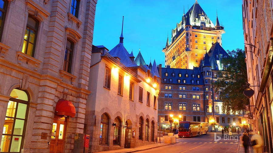 A Scenic View Of A Yellow Alley In Quebec City Wallpaper