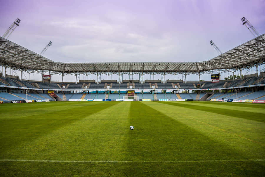 A Soccer Field With A Ball On It Wallpaper