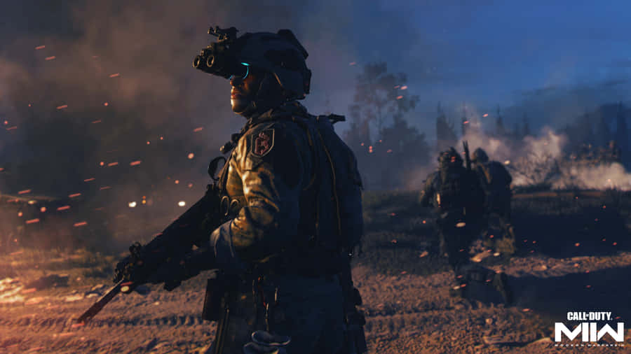 A Soldier Is Standing In The Middle Of A Fire Wallpaper