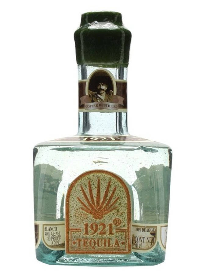 A Sophisticated Bottle Of 1921 Tequila Blanco, Showcasing Elegance And Tradition. Wallpaper