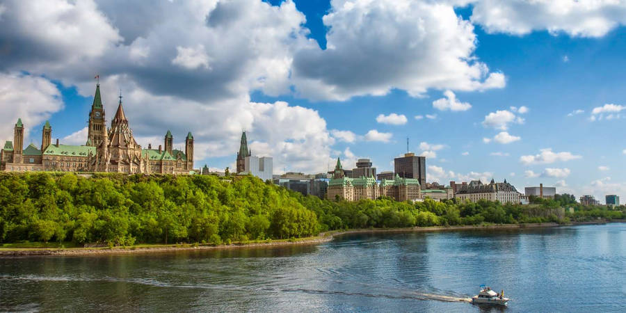 A Speedboat Crossing Ottawa River Wallpaper