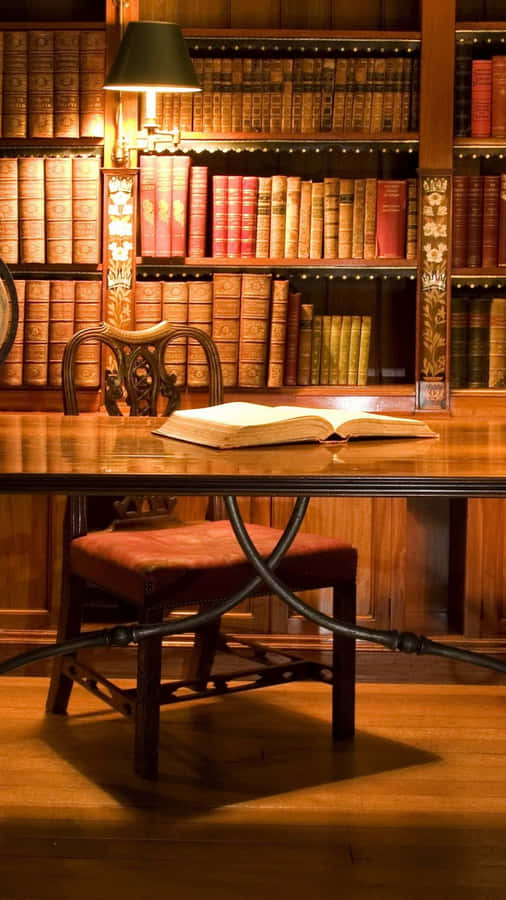 A Stack Of Illustrated Books Against An Iphone 11 Pro Background Wallpaper