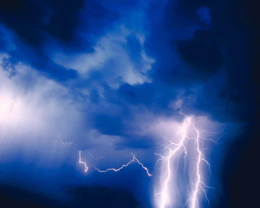 A Stunning Flash Of Blue Lightning Wallpaper