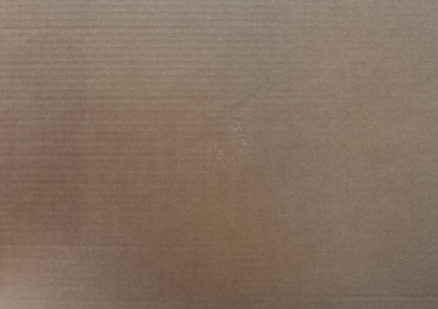 A Sturdy Cardboard Box Provides Ideal Protection For Boxing Equipments Wallpaper