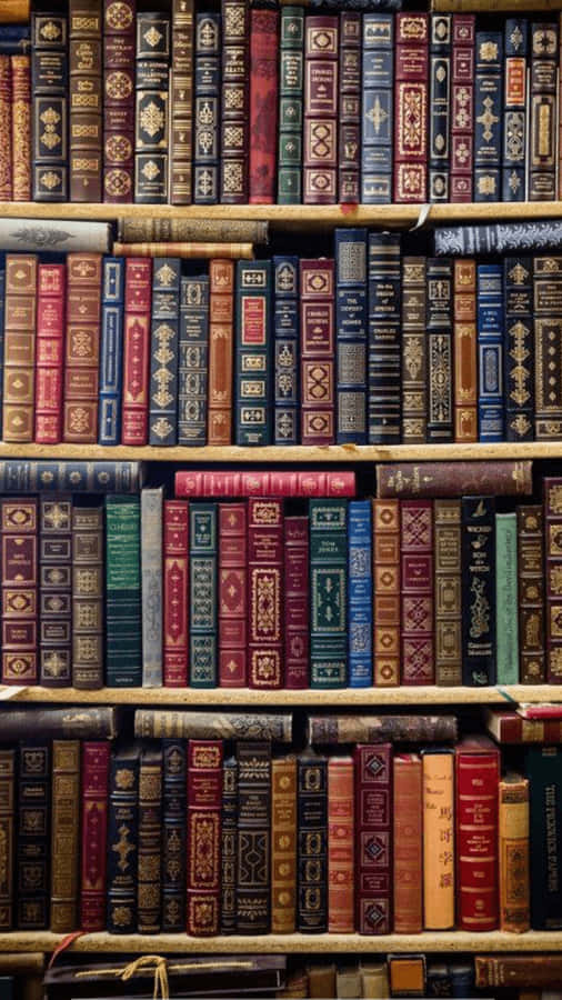 A Stylized Brown Leatherbound Book On Display Against An Iphone Screen Wallpaper