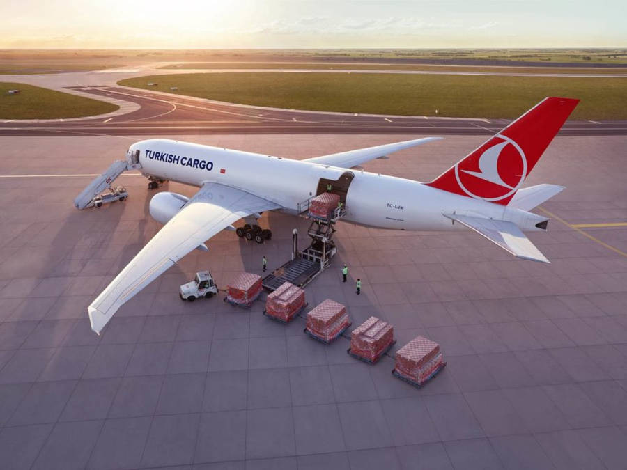 A Turkish Airlines Cargo Plane Prepped For Takeoff Wallpaper