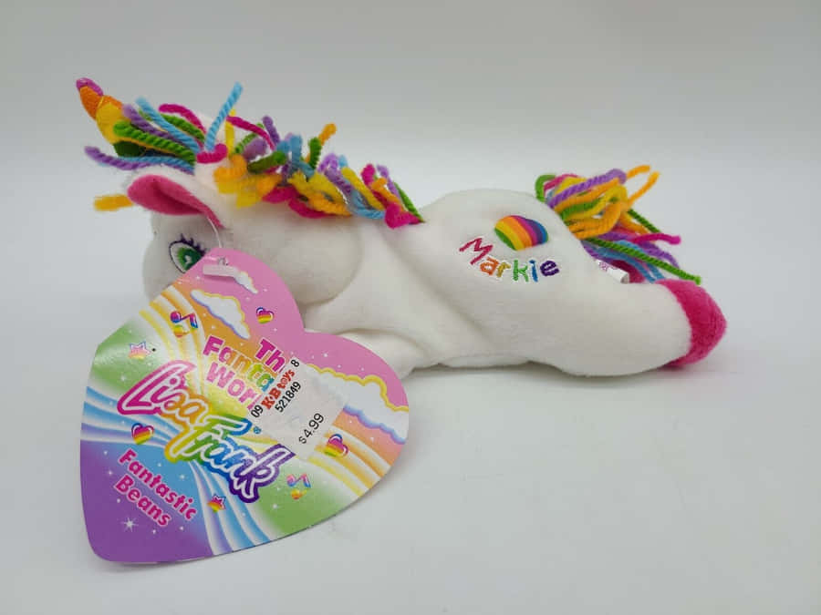 A Unicorn Stuffed Animal With A Heart On It Wallpaper