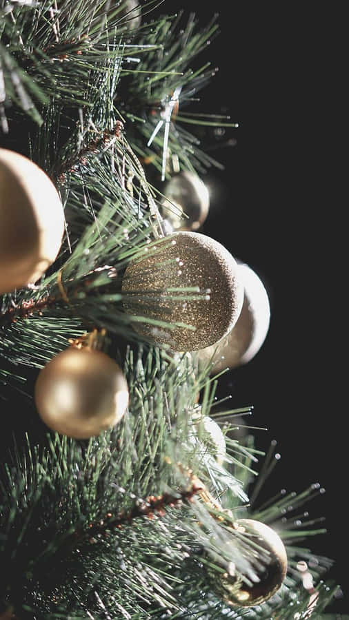 A Unique Christmas Tree With Aesthetic Ornaments And Neon Lights. Wallpaper