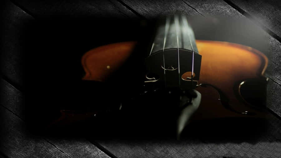 A Violin Provides Beauty, Elegance, And Grace In Any Performance. Wallpaper