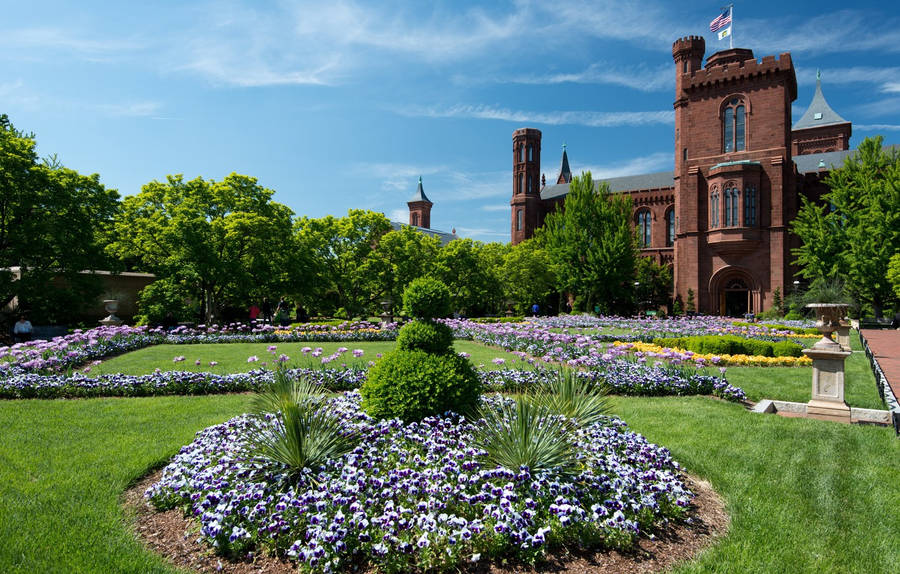 A Warm Summer View At The Smithsonian Castle Wallpaper