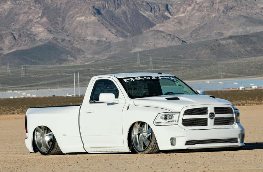 A White Truck In The Desert Wallpaper