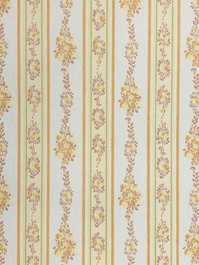A Yellow And White Striped Wallpaper With Floral Designs Wallpaper