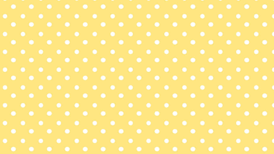 A Yellow Polka Dot Background With White Dots Wallpaper