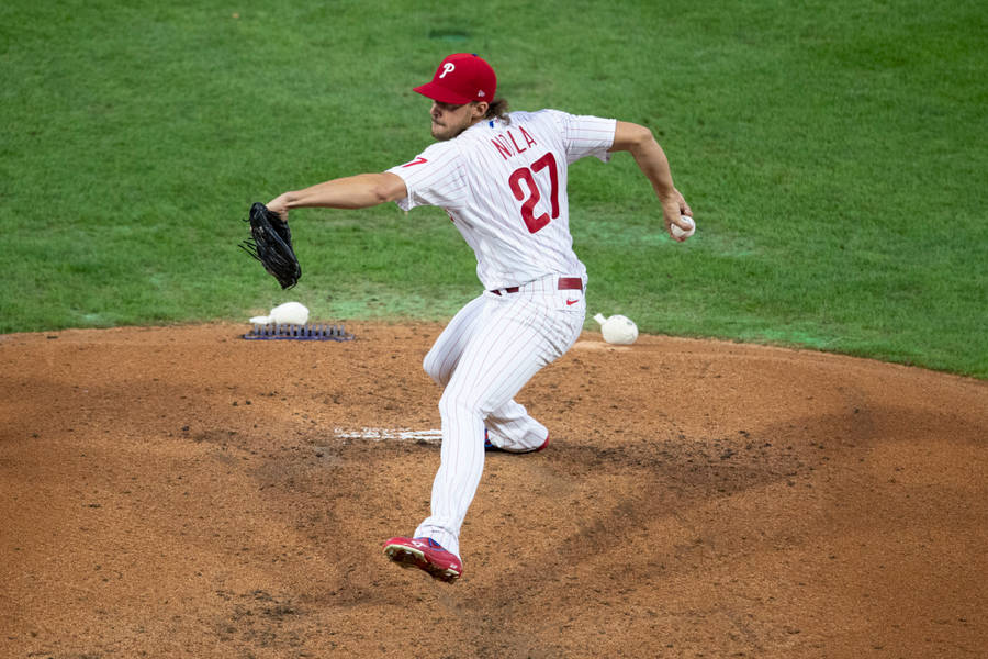 Aaron Nola Preparing A Fast Ball Pitch Wallpaper