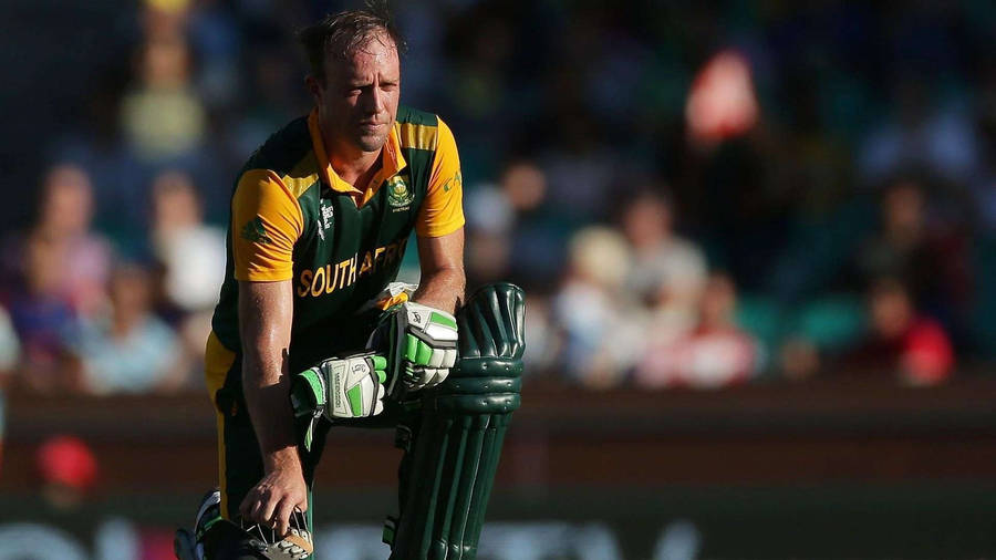 Ab De Villiers Kneeling On Field Wallpaper