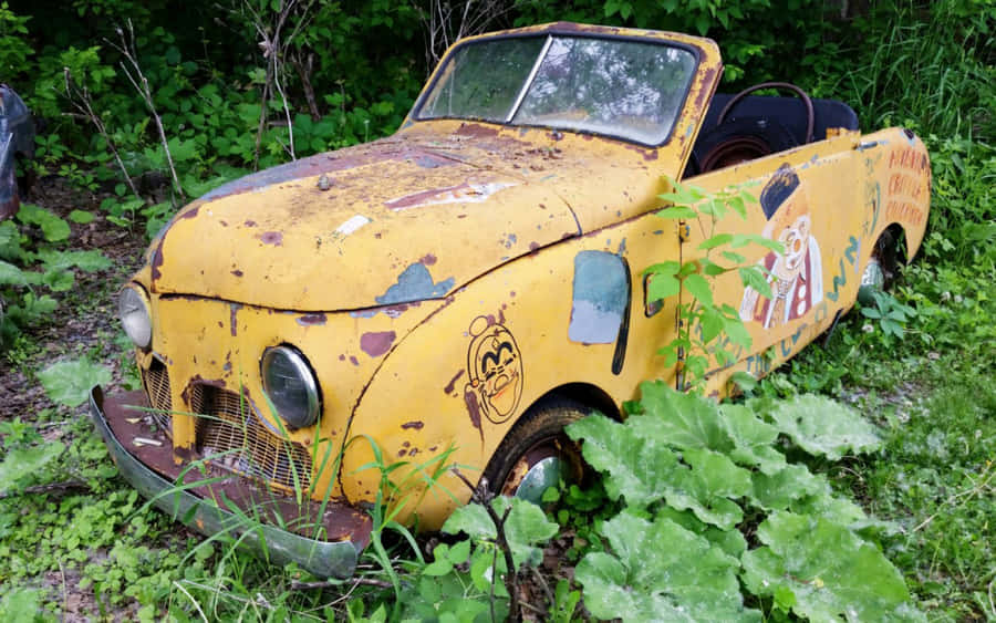 Abandoned Clown Themed Car Wallpaper