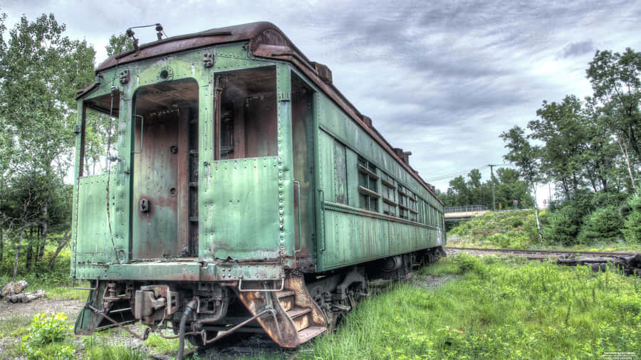 Abandoned Green Railcar Wallpaper