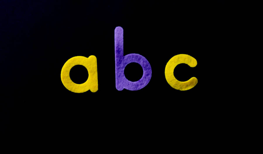 Abc Letters Purple And Yellow Colour Wallpaper