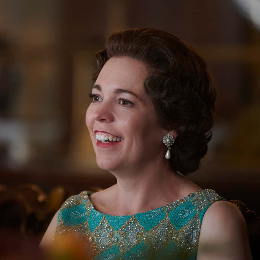 Academy Award Winner Olivia Colman Posing At The Red Carpet Event. Wallpaper