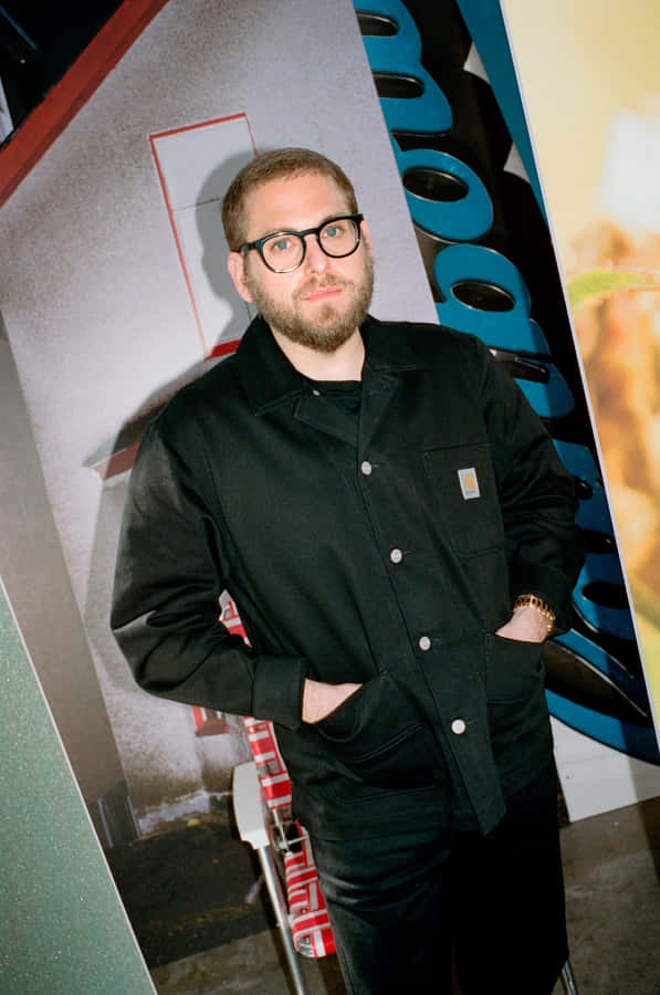 Actor Jonah Hill Looks Beautiful Against A Vibrant Blue Sky Wallpaper