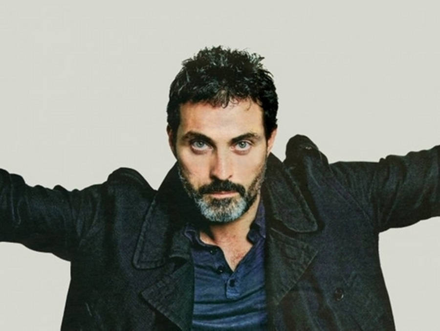 Actor Rufus Sewell Sporting A Black Denim Jacket Wallpaper