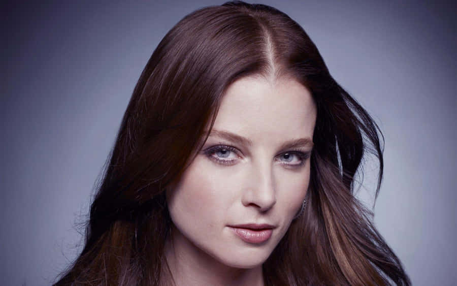 Actress Rachel Nichols Posing For The Camera Wallpaper