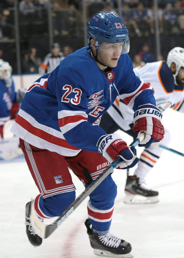 Adam Fox Blue New York Rangers Number 23 Wallpaper