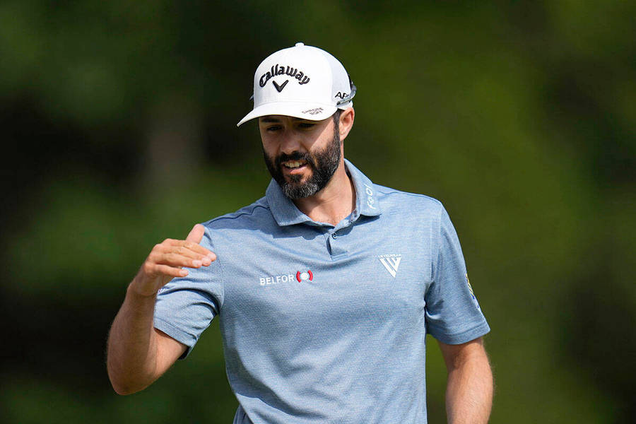 Adam Hadwin Powering A Drive On The Golf Course Wallpaper