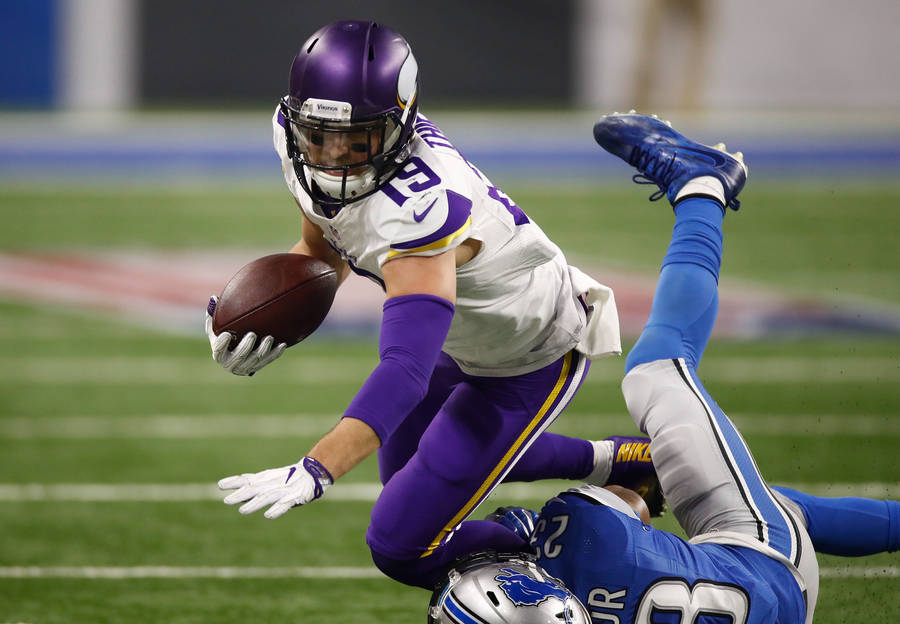 Adam Thielen Powerful Defense Wallpaper