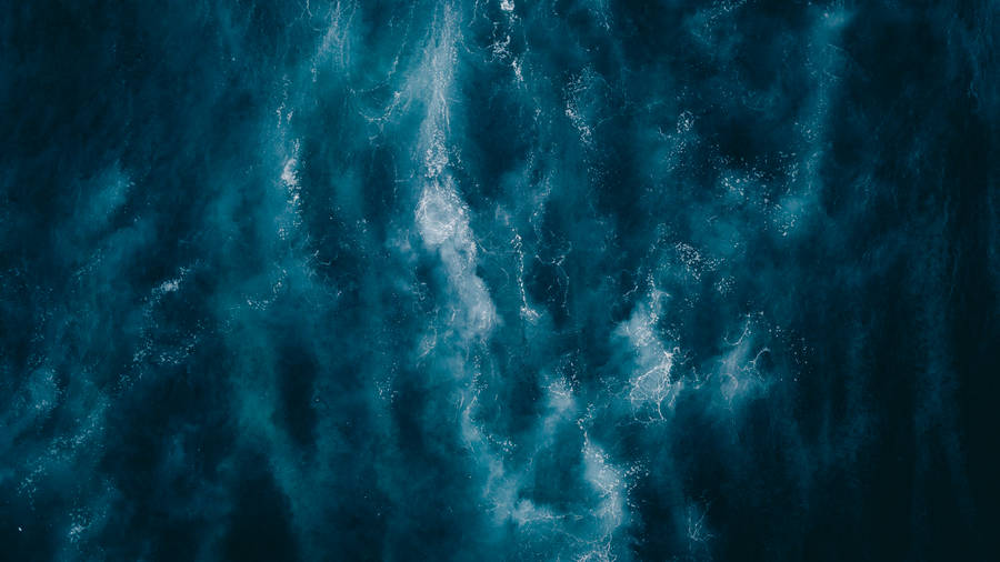 Aerial View Navy Blue Ocean Wallpaper