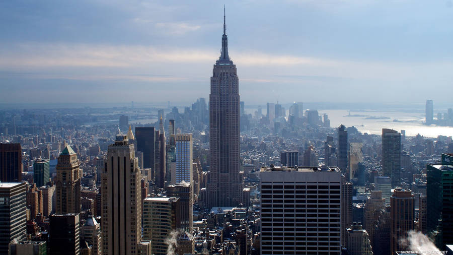 Aerial View Of The Iconic Empire State Building In New York Wallpaper