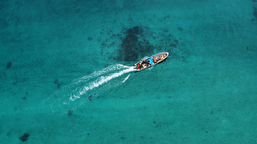 Aerial View Of Traditional Canoe In Papua New Guinea Wallpaper