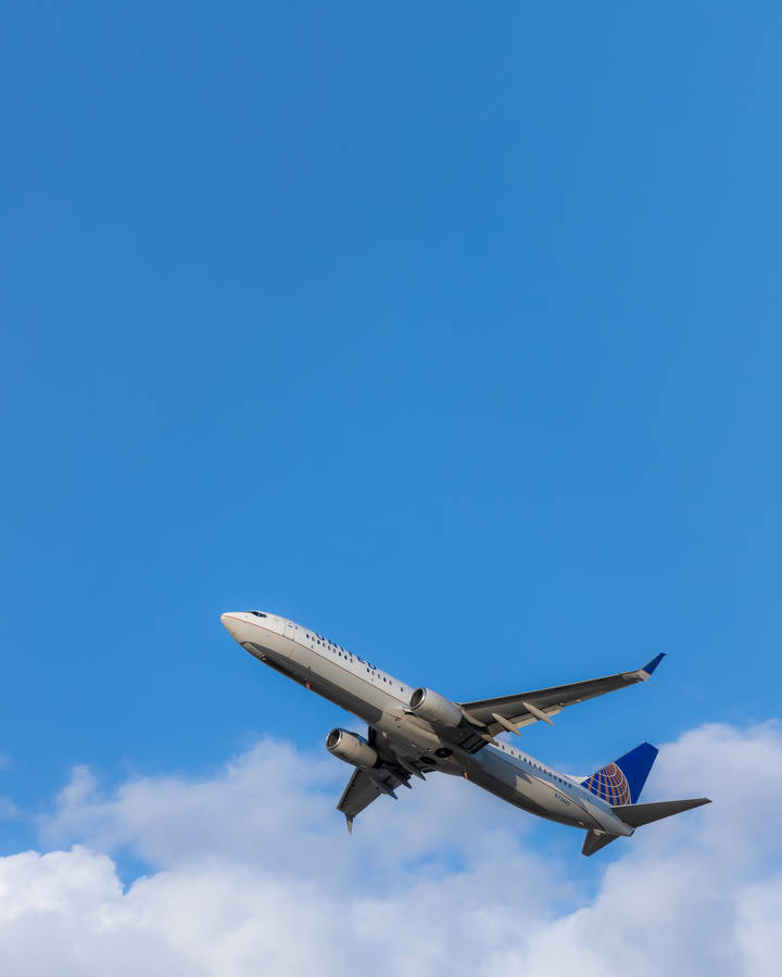 Aeroplane Cloudy Blue Sky Wallpaper