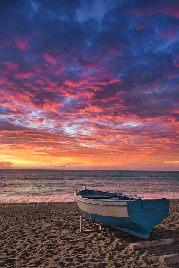 Aesthetic Beach Sunset Cloudy Sky Wallpaper