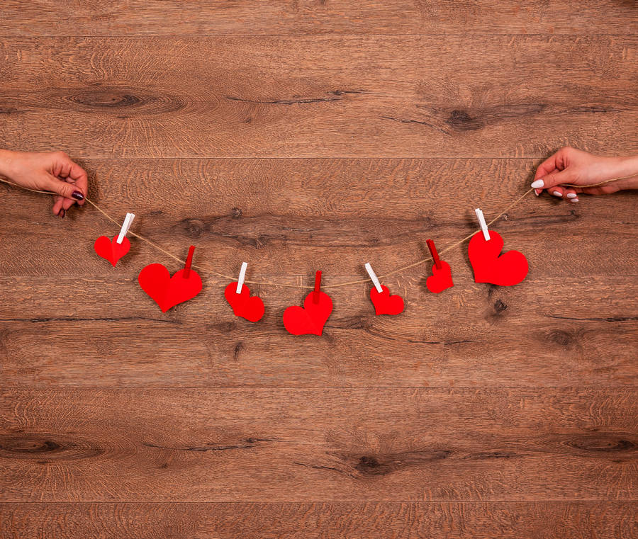 Aesthetic Heart Cutouts On A String Wallpaper